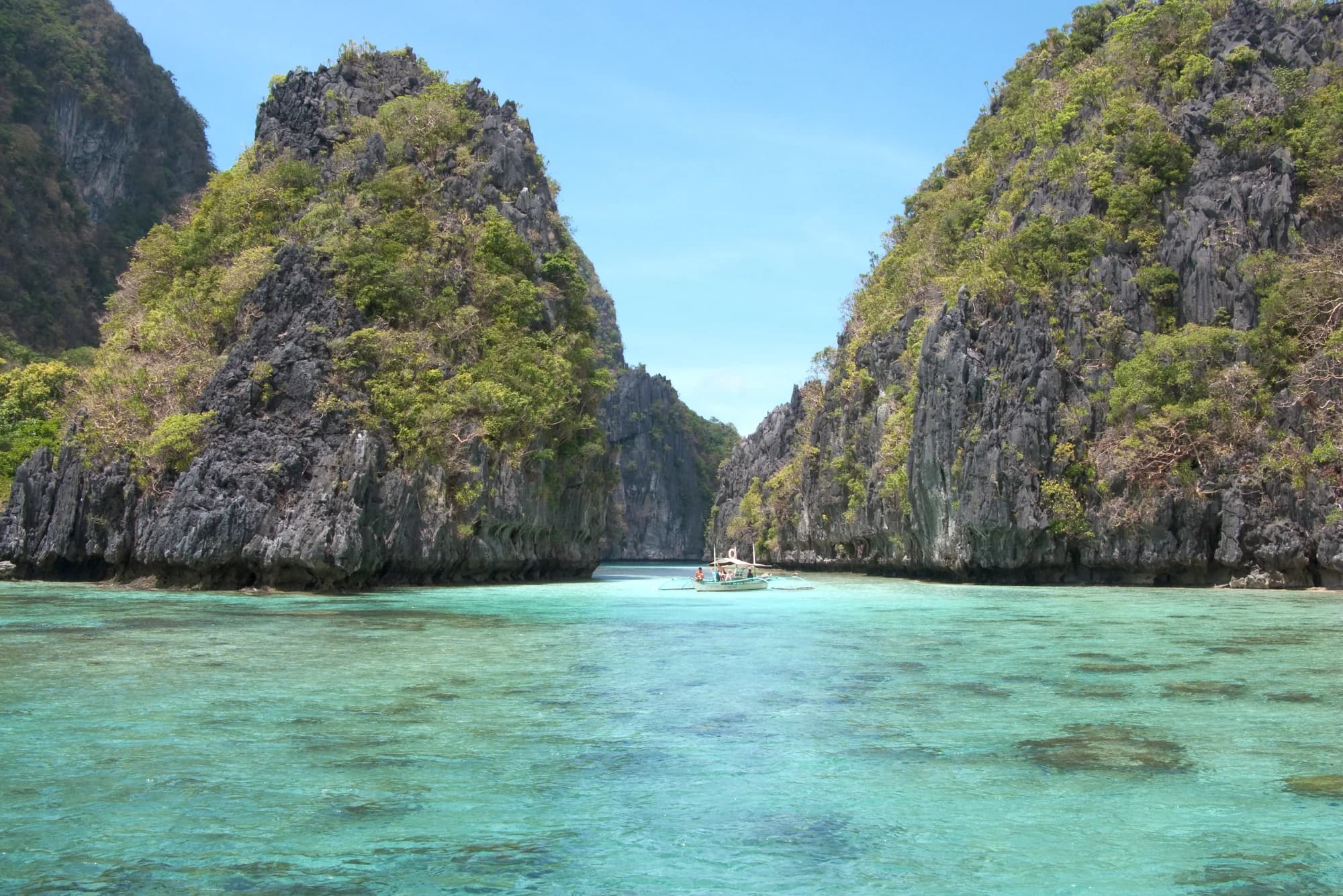 Limestone cliffs above the turquoise water in El Nido, Philippines